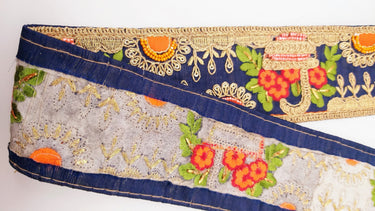 Navy Blue Art Silk Fabric Trim With Green, Orange, Red And Gold Floral Embroidery
